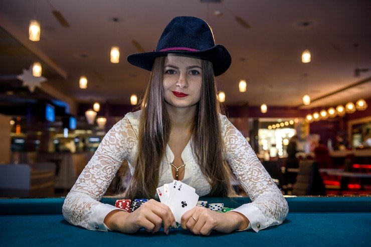 Live dealer table with cards and chips on screen